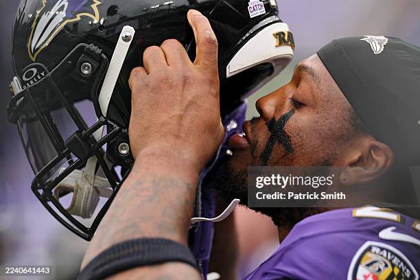 Running back Derrick Henry of the Baltimore Ravens looks on against the Los Angeles Rams at M&T Bank Stadium on October 12, 2025 in Baltimore,...