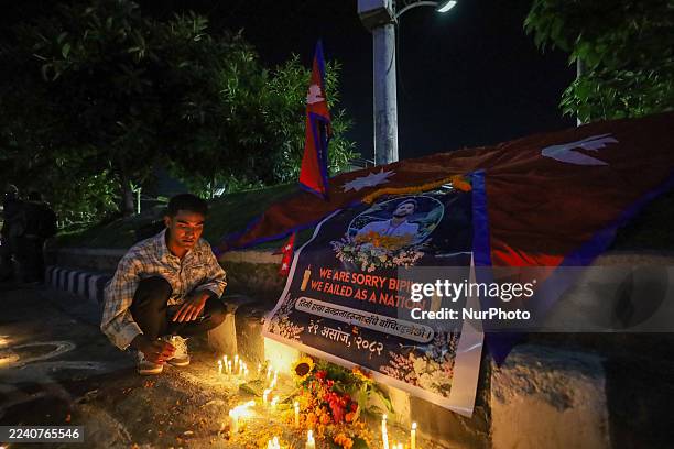 Nepali student pays respect to Bipin Joshi, a Nepali student killed in Palestinian militant group Hamas custody, during a candlelight vigil held in...