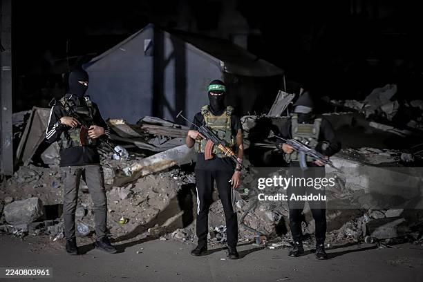 Bodies of two Israeli hostages are handed over to the International Committee of the Red Cross by the Al-Qassam Brigades, the armed wing of Hamas, as...