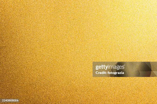 golden glitter texture background — luxury sparkling surface - carta stagnola foto e immagini stock