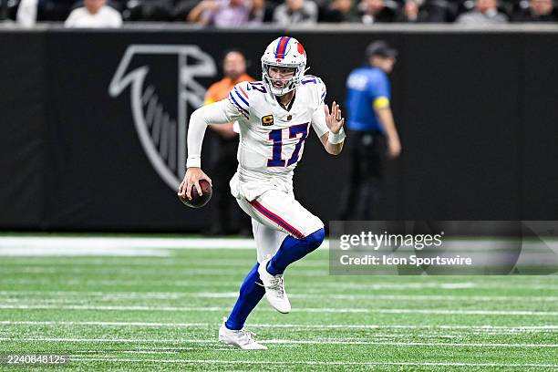 Buffalo quarterback Josh Allen rolls out of the pocket during the NFL game between the Buffalo Bills and the Atlanta Falcons on October 13th, 2025 at...