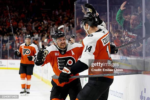 Sean Couturier of the Philadelphia Flyers celebrates his goal with Travis Konecny during the second period against the Florida Panthers at Xfinity...