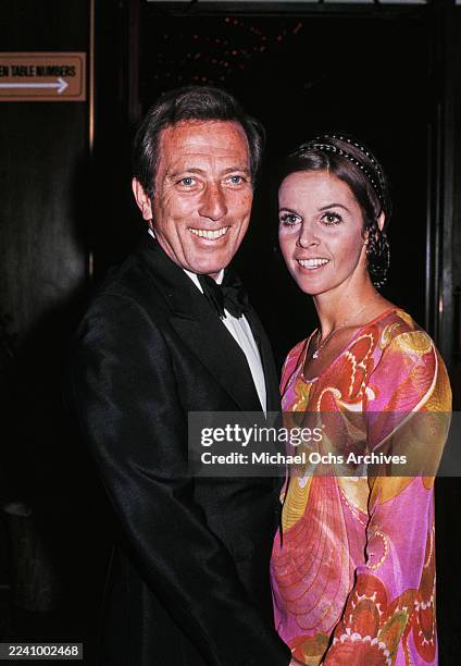 American singer Andy Williams, wearing a tuxedo and bow tie, and his wife, Franco-American singer, actress and dancer Claudine Longet, wearing a...