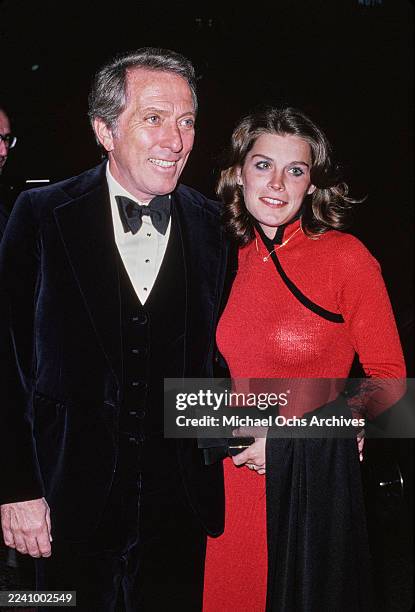 American singer Andy Williams, wearing a tuxedo and bow tie, and his wife, Franco-American singer, actress and dancer Claudine Longet, who wears a...