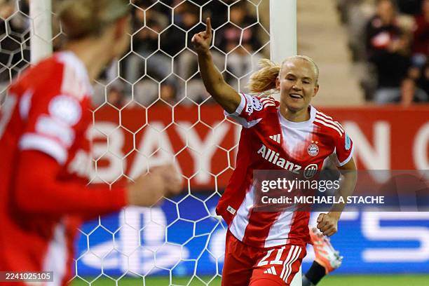 Bayern Munich's Danish forward Pernille Harder celebrates after scoring the opening 1-0 goal during the UEFA Women's Champions League, league phase...