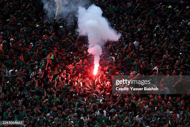 Fans of Saudi Arabia set off pyrotechnics after the FIFA World Cup 2026 qualifier match between Saudi Arabia and Iraq at King Abdullah Sport City...