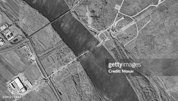 Vantor Satellite imagery provides a close-up view of the new road-bridge corridor at the Tumen River crossing between Tumangang and Khasan . Abutment...