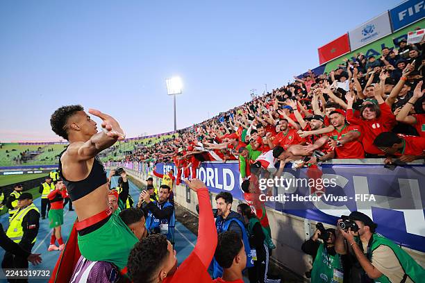 Fouad Zahouani of Morocco and teammates celebrate after winning the FIFA U-20 World Cup Chile 2025 semi-final match between Morocco and France at...