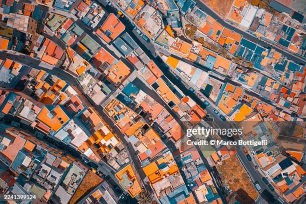 aerial view of a vibrant maze-like city with colorful rooftops in las palmas de gran canaria, spain - urban sprawl stock pictures, royalty-free photos & images
