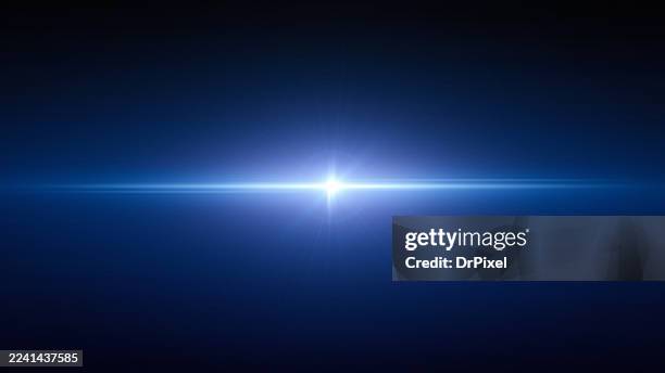blue light flare on dark background - jet de flamme photos et images de collection