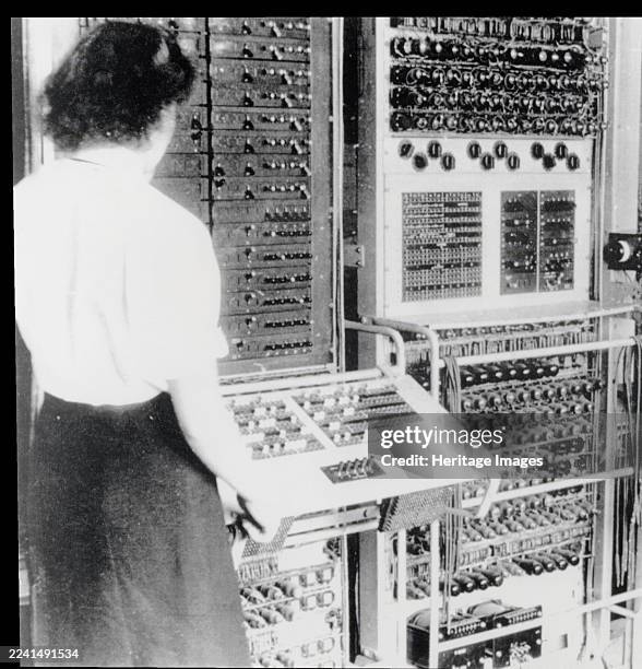 Colossus codebreaking computer in operation, World War II, 1943. Colossus, the first electronic digital computer, was developed to help break German...