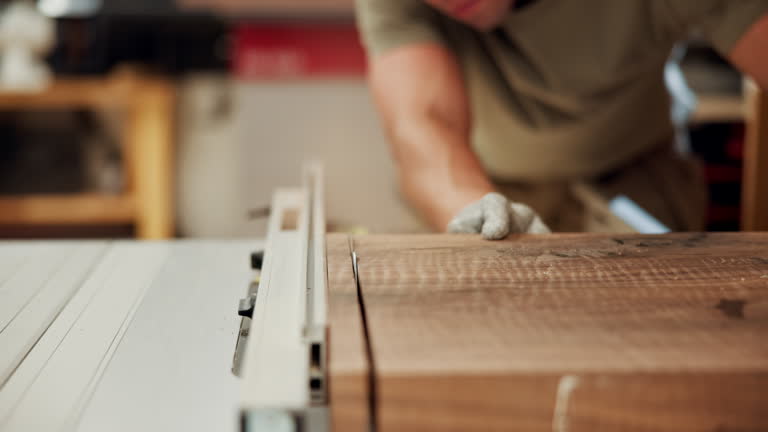https://media.gettyimages.com/id/2241556413/video/carpenter-furniture-and-hands-of-man-with-saw-machine-for-construction-production-and.jpg?b=1&s=640x640&k=20&c=13DjK8ldElTwVjszpSJHr8MIqkxb2IK_aWlOLRUlVVg=