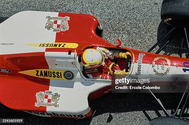 Tight cockpit overhead view of Olivier Beretta from Monaco sitting aboard the Tourtel Kronenbourg Larrousse F1 Larrousse LH94 Ford Cosworth HB V8...