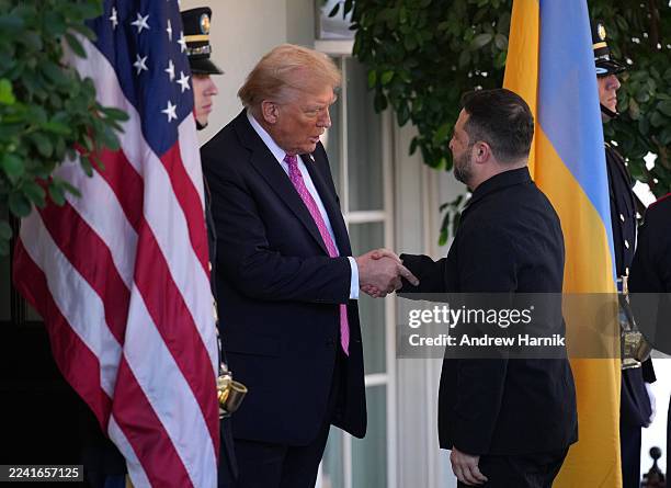 President Donald Trump greets Ukrainian President Volodymyr Zelensky outside the West Wing of the White House on October 17 in Washington, DC....