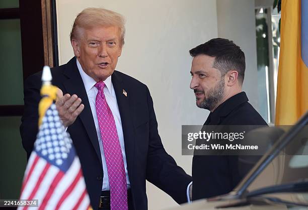 President Donald Trump greets Ukrainian President Volodymyr Zelensky outside the West Wing of the White House on October 17 in Washington, DC....