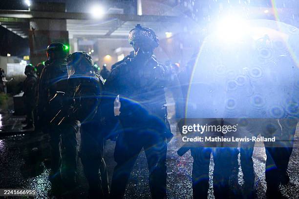 Anti-I.C.E. Protesters clash with federal agents at the U.S. Immigration and Customs Enforcement building on October 18, 2025 in Portland, Oregon....