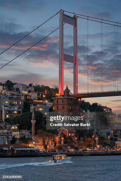 twilight majesty of rumeli hisar and the bosphorus bridge - bosphorus stock pictures, royalty-free photos & images