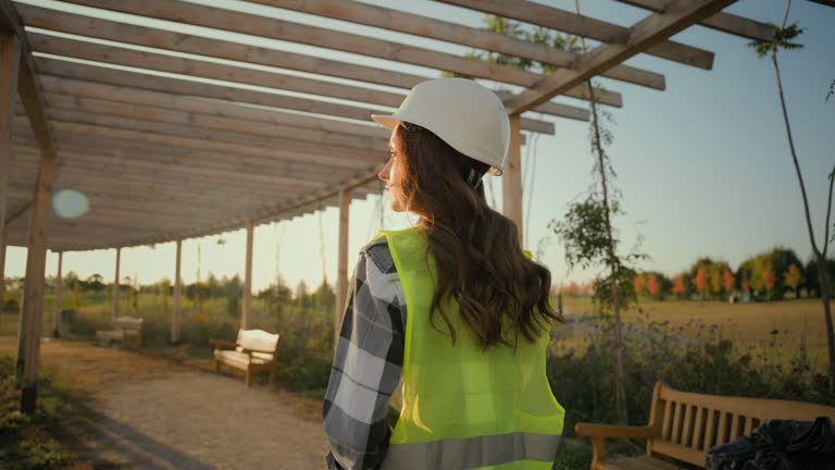 https://media.gettyimages.com/id/2241710590/video/back-view-caucasian-woman-female-lady-investor-builder-businesswoman-environmental-engineer.jpg?b=1&s=640x640&k=20&c=QExU1G-gf7KNV9sIIGvkVCgma8RJYRnk64zXTJqxmkI=