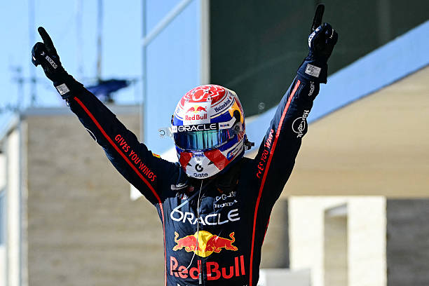 Red Bull Racing's Dutch driver Max Verstappen celebrates after winning the United States Formula One Grand Prix at the Circuit of the Americas in...