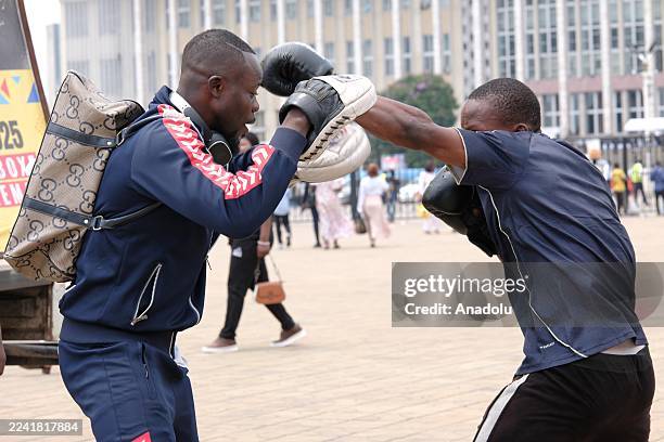 Young boxers are seen during the events marking the 50th anniversary of the 'Rumble in the Jungle' in Kinshasa, the capital of the Democratic...