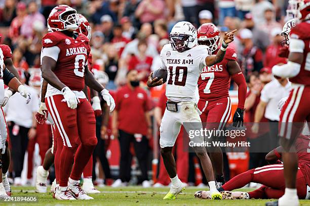 Marcel Reed of the Texas A&M Aggies signals for a first down in the first half during a game against the Arkansas Razorbacks at Donald W. Reynolds...