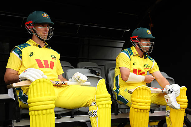 Mitchell Marsh and Travis Head of Australia wait to head out to open the batting during game one of the One Day International series between...