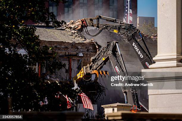 The facade of the East Wing of the White House is demolished by work crews on October 21, 2025 in Washington, DC. The demolition is part of U.S....