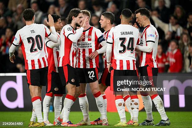 Eindhoven's Dutch midfielder Guus Til, PSV Eindhoven's Spanish defender Yarek Gasiorowski PSV Eindhoven's Moroccan midfielder Ismael Saibari, PSV...