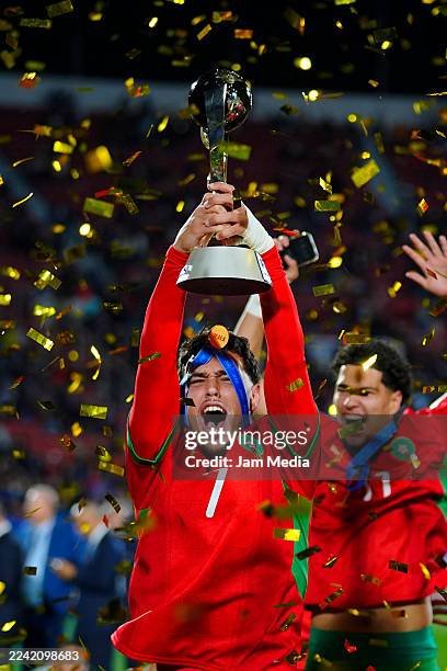 Othmane Maamma of Morocco celebrates with the FIFA U-20 World Cup Championship trophy after a victory over Argentina during the FIFA U-20 World Cup...