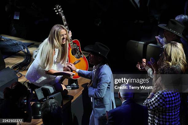 Megan Moroney performs onstage to honor Kenny Chesney during the Medallion Ceremony for the Class of 2025 at Country Music Hall of Fame and Museum on...
