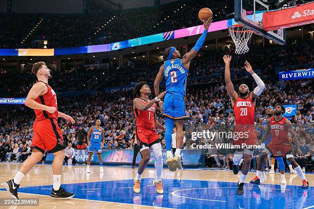Shai Gilgeous-Alexander of the Oklahoma City Thunder shoots the ball during overtime against the Houston Rockets at Paycom Center on October 21, 2025...