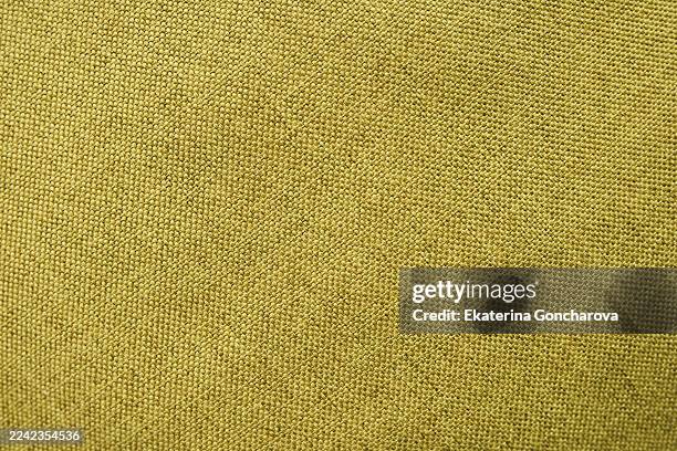 mustard yellow fabric texture closeup, rich textile details for design and fashion backgrounds - chiffon foto e immagini stock