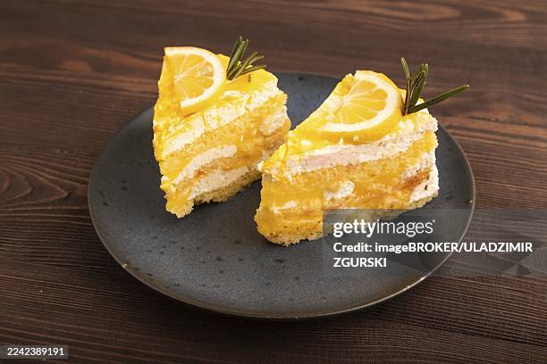lemon cake on brown wooden background, side view, copy space - lemon cake stock pictures, royalty-free photos & images