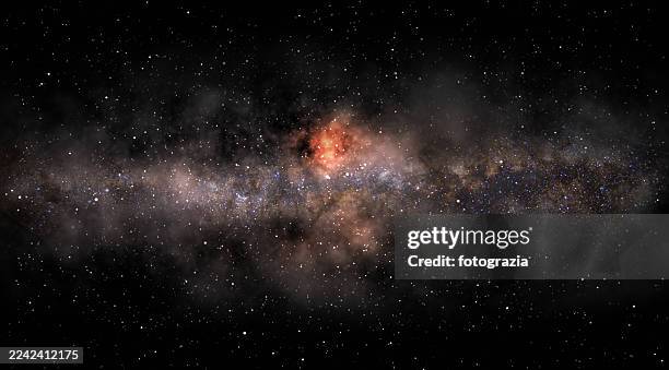 milky way galaxy with glowing red nebula core - locais geográficos imagens e fotografias de stock