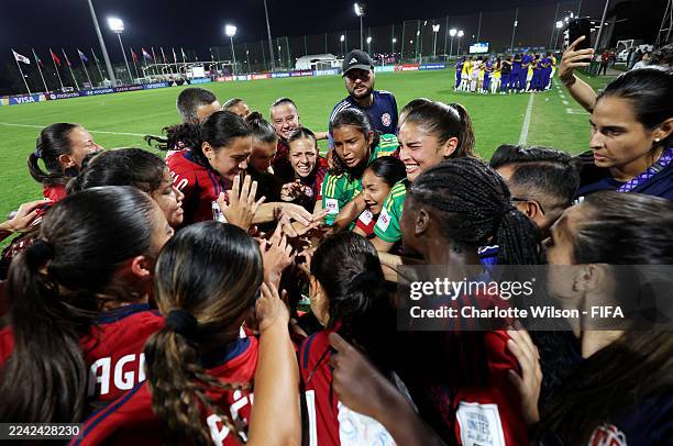 Players of Costa Rica celebrate in a huddle after the FIFA U-17 Women's World Cup Morocco 2025 Group A match between Costa Rica and Brazil at...