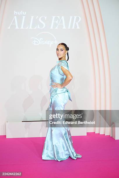 Kim Kardashian wears a structured off-the-shoulder satin and lustrous maxi gown, low-neck dress by Christian Dior Spring/Summer 2000 collection, in...