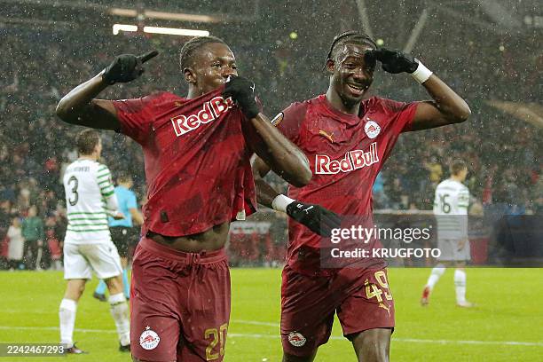 Salzburg's Ghanaian forward Edmund Baidoo celebrates scoring his team's first goal with Salzburg's Malian midfielder Moussa Yeo during the UEFA...