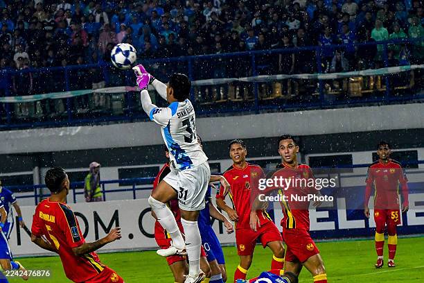 Selangor FC goalkeeper Sikh Izhan saves the ball during the AFC Champions League Two match at Gelora Bandung Lautan Api Stadium in Bandung, West...