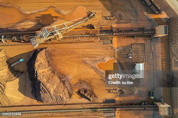 aerial view of engineering vehicles working in non-ferrous metal mines - copper mine stock pictures, royalty-free photos & images