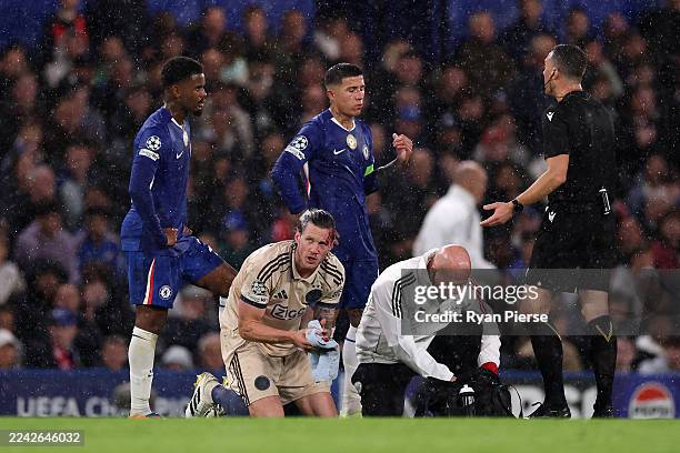 Wout Weghorst of AFC Ajax receives medical treatment to a bloodied head injury during the UEFA Champions League 2025/26 League Phase MD3 match...