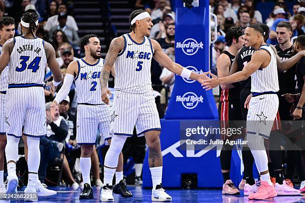 Paolo Banchero of the Orlando Magic celebrates with Desmond Bane in the first half of the game against the Miami Heat at Kia Center on October 22,...
