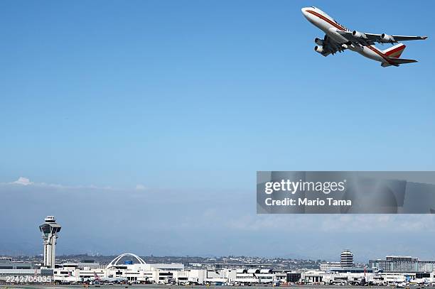 Kalitta Air plane takes off near the air traffic control tower at Los Angeles International Airport on October 22, 2025 in Los Angeles, California....