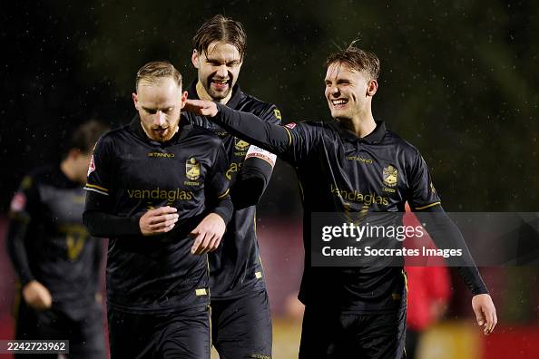 Fc Pascal Romano Postema of FC Emmen, Pascal Mulder of FC Emmen, Lukas Lind ...