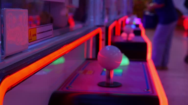 https://media.gettyimages.com/id/2242759140/video/transparent-light-bulb-shaped-joystick-controller-on-pink-arcade-game-machine-in-retro.jpg?b=1&s=640x640&k=20&c=8GIDJNrOjHB_c_Juq6oVir4GCi_q6kEATxe-xpvTdxo=