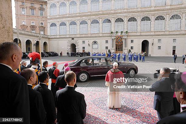 Pope Leo XVI greets King Charles III and Queen Camilla as they leave via car the Apostolic Palace on October 23, 2025 in Vatican City, Vatican....