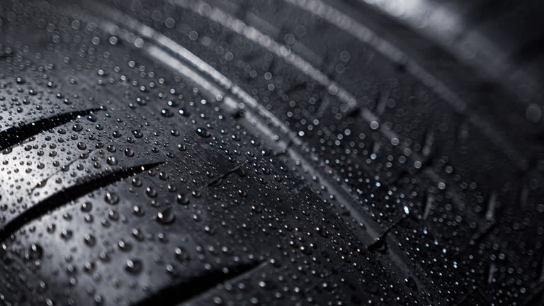 https://media.gettyimages.com/id/2242797645/video/tread-pattern-with-waterdrops-on-a-spinning-car-tire.jpg?b=1&s=640x640&k=20&c=4RdcE0rP7UoW4AC1UpRAsv4u6sdIISeAxTsz7b4aXW4=