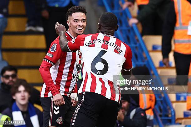 Sunderland's Moroccan midfielder Chemsdine Talbi celebrates with Sunderland's Dutch defender Lutsharel Geertruida after scoring their second goal...