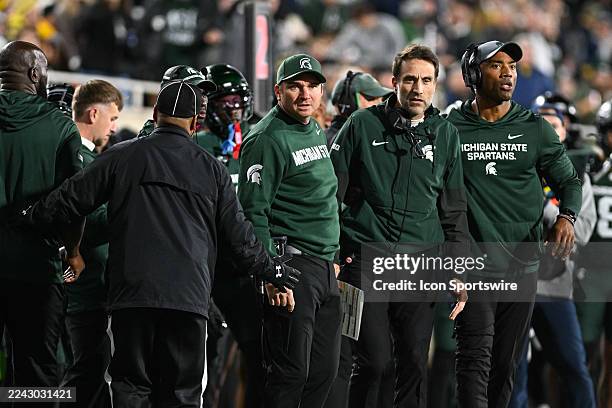 Michigan State Spartans head coach Jonathan Smith shows his displeasure with an early penalty during a college football game between the Michigan...