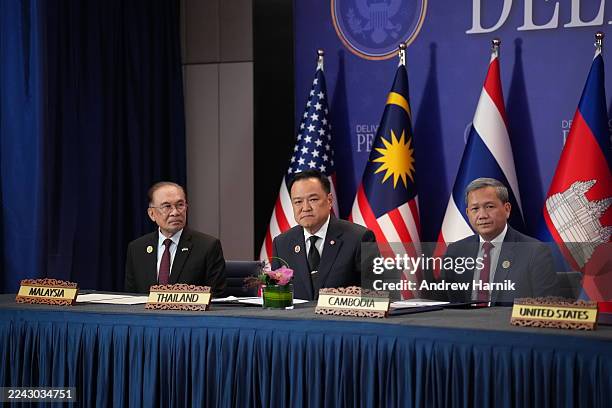 Malaysian Prime Minister Anwar Ibrahim, Thai Prime Minister Anutin Charnvirakul and Cambodian Prime Minister Hun Manet look on as U.S. President...