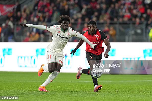 Kojo PEPRAH OPPONG of Nice and Breel EMBOLO of Rennes during the Ligue 1 McDonald's match between Rennes and Nice at Roazhon Park on October 26, 2025...